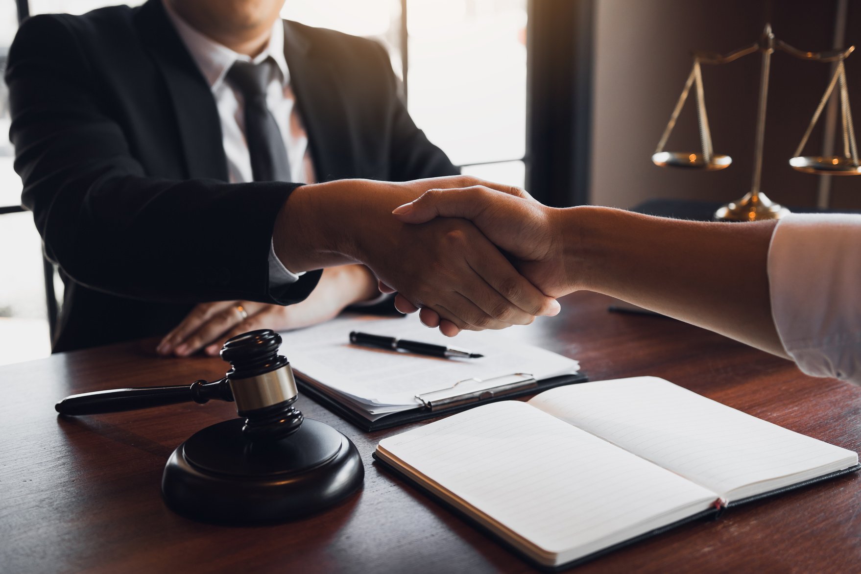 Lawyer and Client Shaking Hands